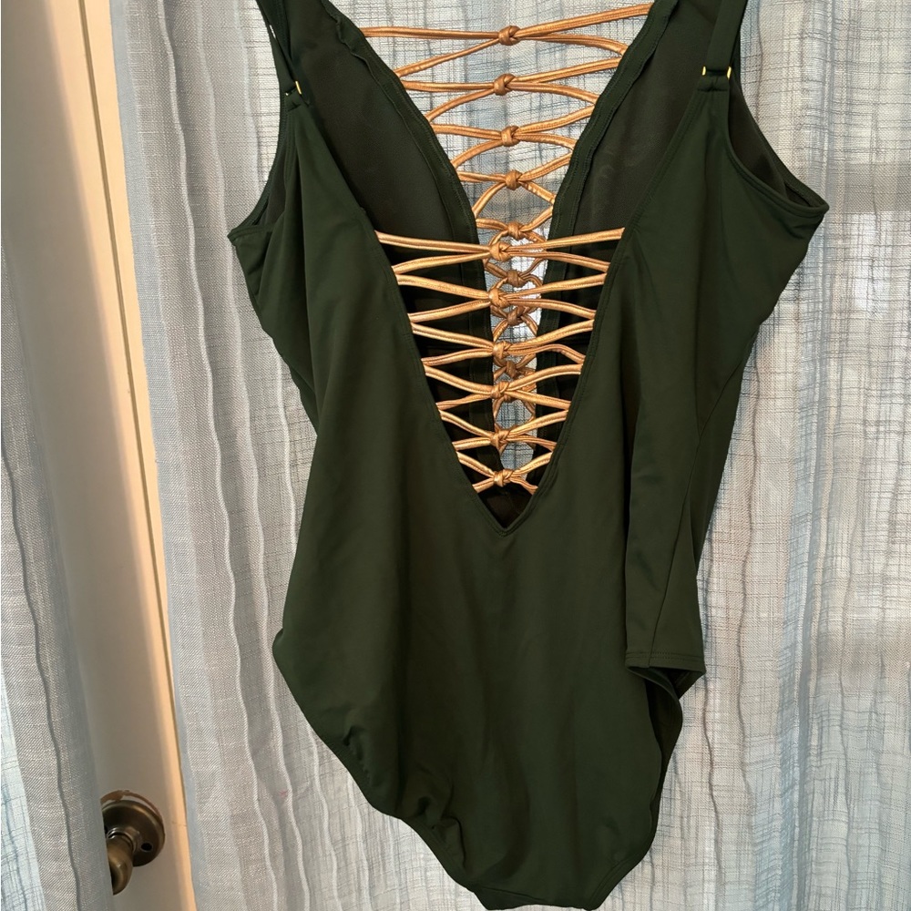 Gently worn shape control hunter green swimsuit.